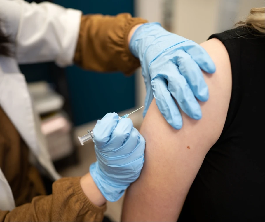 Patient receiving a vaccine shot